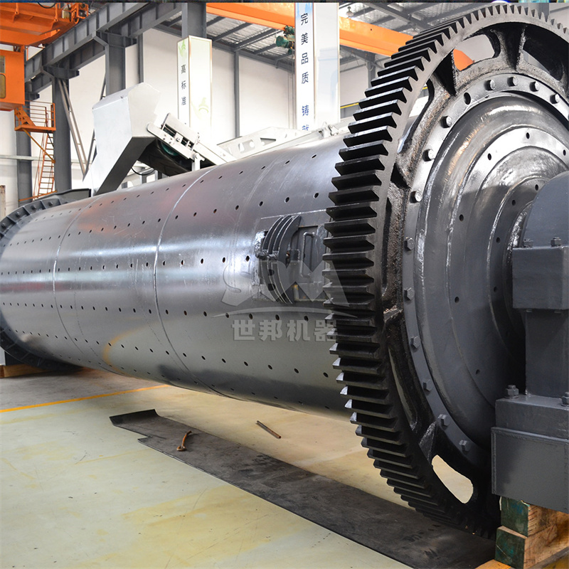Diagram of a ball mill showing grinding media and material flow