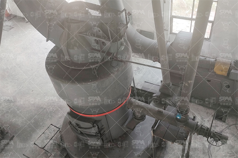 Magnesite mining site with raw ore stockpiles for grinding plant processing